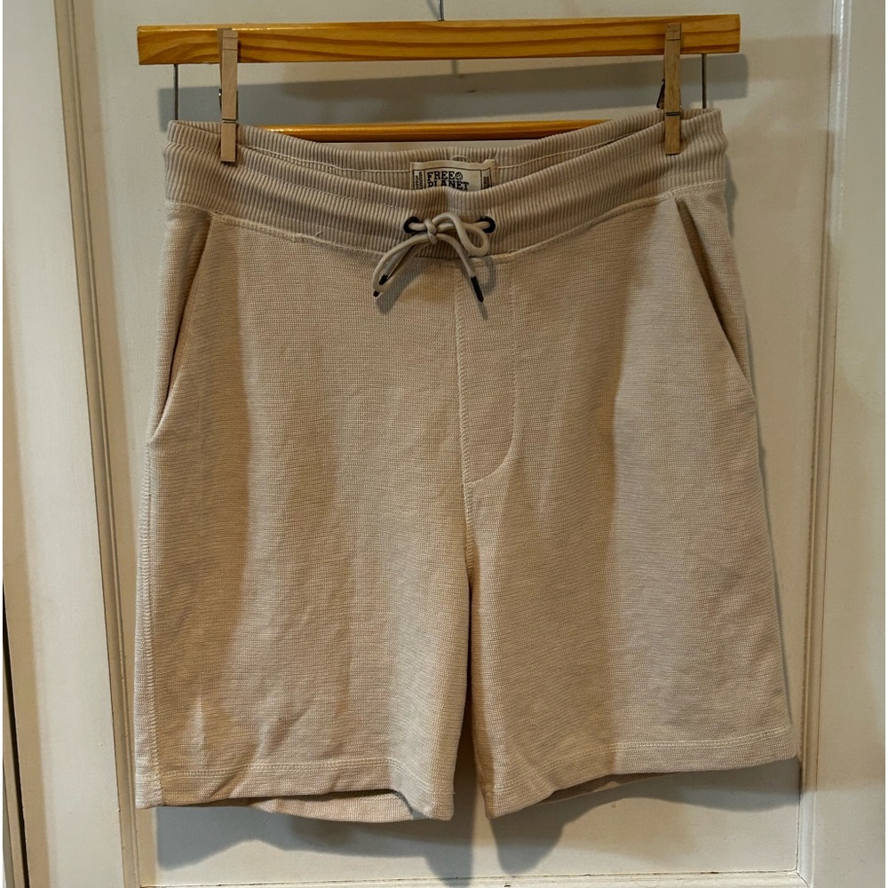 Free Planet Beige cotton drawstring shorts.